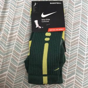 Yellow and green Nike elite dri-fit socks.